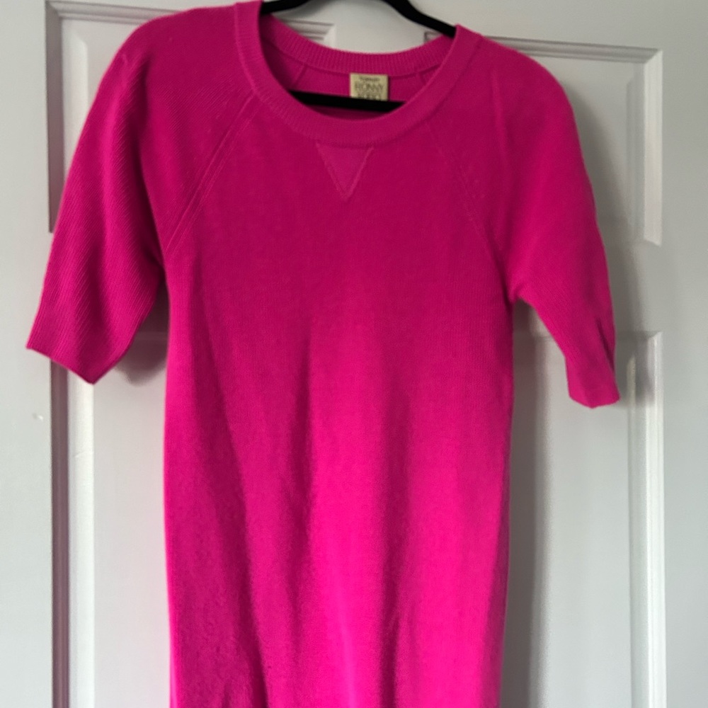 Fushia knit dress. Torn by Ronny Kobo